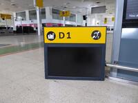 Airport Check-in desk sign and monitor 'D1?