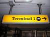 Terminal 1 direction sign, illuminated. Curved metal edge construction including internal light fittings. - 3