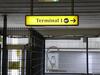 Terminal 1 direction sign, illuminated. Curved metal edge construction including internal light fittings. - 4