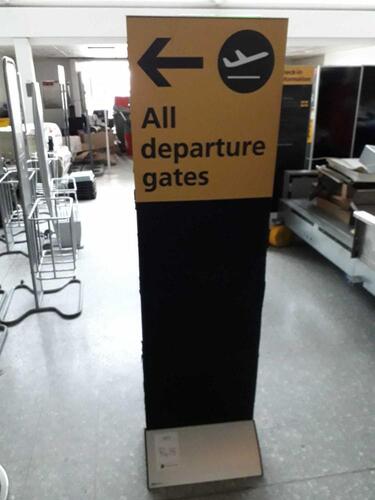 Heathrow floor mounted 'All departure gates' sign