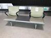 Two person seat and shared middle table, cast alloy construction. Green leather style seat and backs,4 vinyl covered arm rests, chromed feet. L 1600mm D 600mm H 800mm - 2