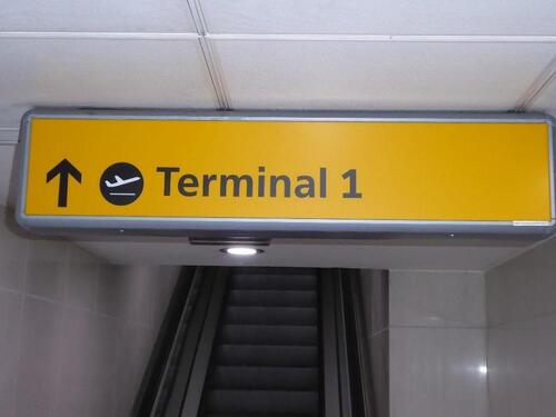 Heathrow Terminal 1 Arrivals Direction departure illuminated sign