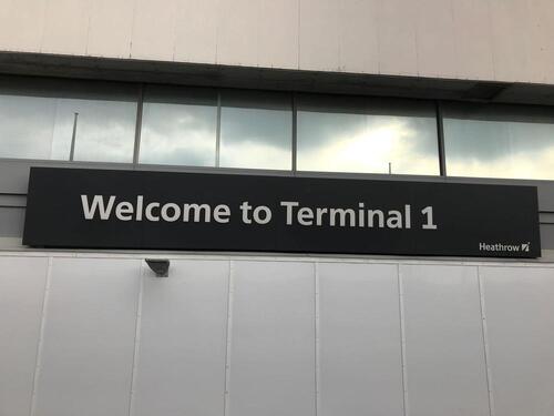 Welcome to Terminal 1 Heathrow Sign, illuminated.